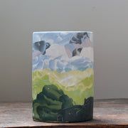 multicoloured ceramic vase in the Nerikomi style by ceramic artist Judy McKenzie