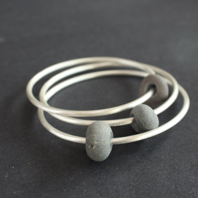 Beach pebble silver abstract bangle by Carin Lindberg