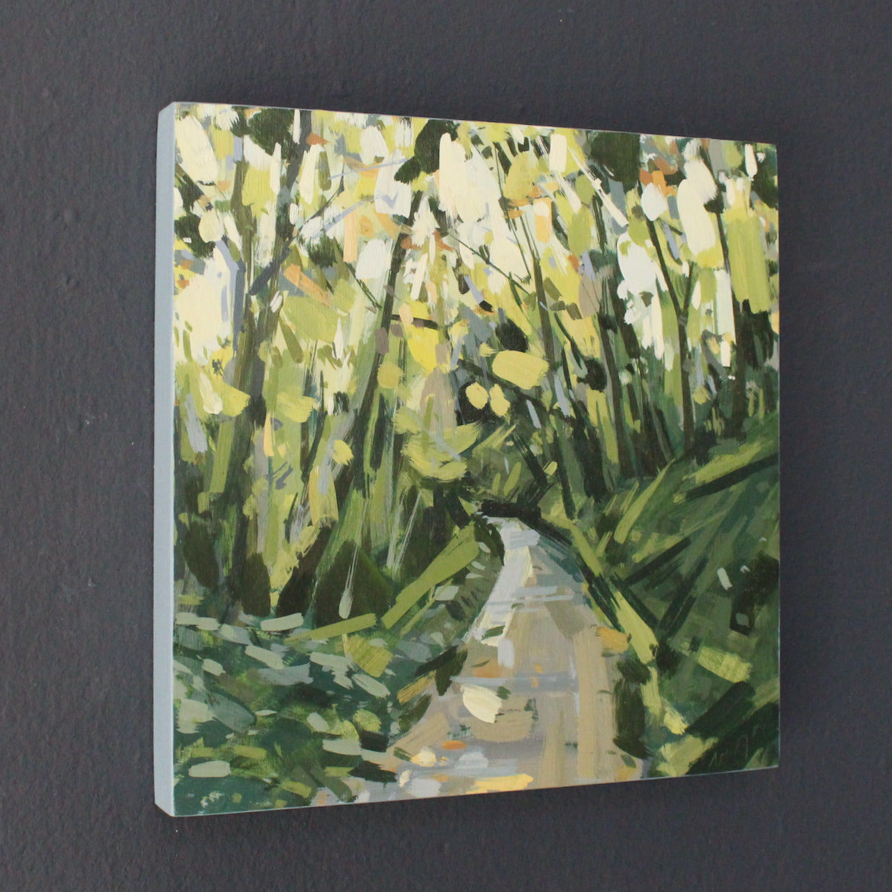 Imogen Bone small square landscape painting of a path through trees in fading light.
