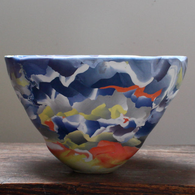 large porcelain Nerikomi bowl in orange, blue and white  by ceramic artist Judy McKenzie.