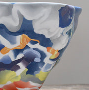 detail of large porcelain Nerikomi bowl in orange, blue and white  by Judy McKenzie