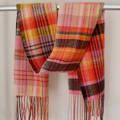 woollen hand-woven scarf in pinks, yellow and black by textile artist Teresa Dunne