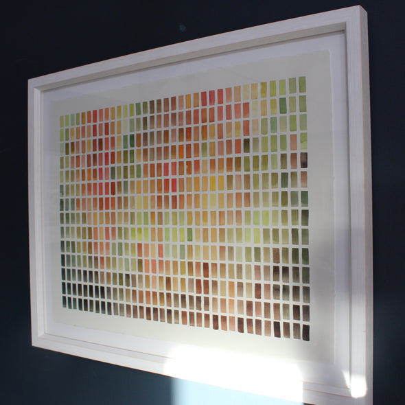 a framed abstract watercolour painting of many coloured rectangles in a grid by Devon based artist David Muddyman.