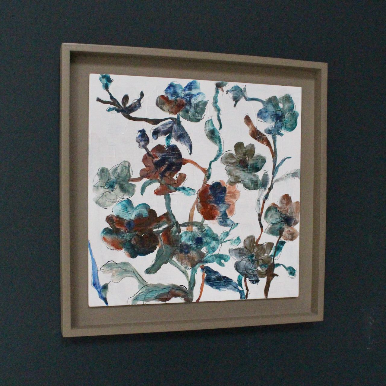 a framed Lucy Innes Williams painting of blue, green and rust coloured flowers it is called Hash Browns