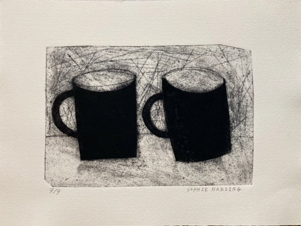 a print by Cornwall artist Sophie Harding of two black mugs