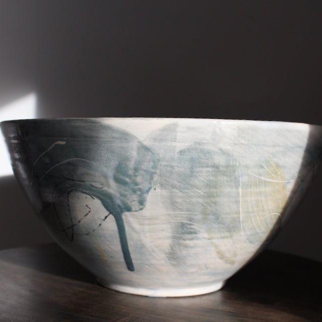 large ceramic bowl glazed in pale greys and yellows made by UK ceramicist Kate Welton