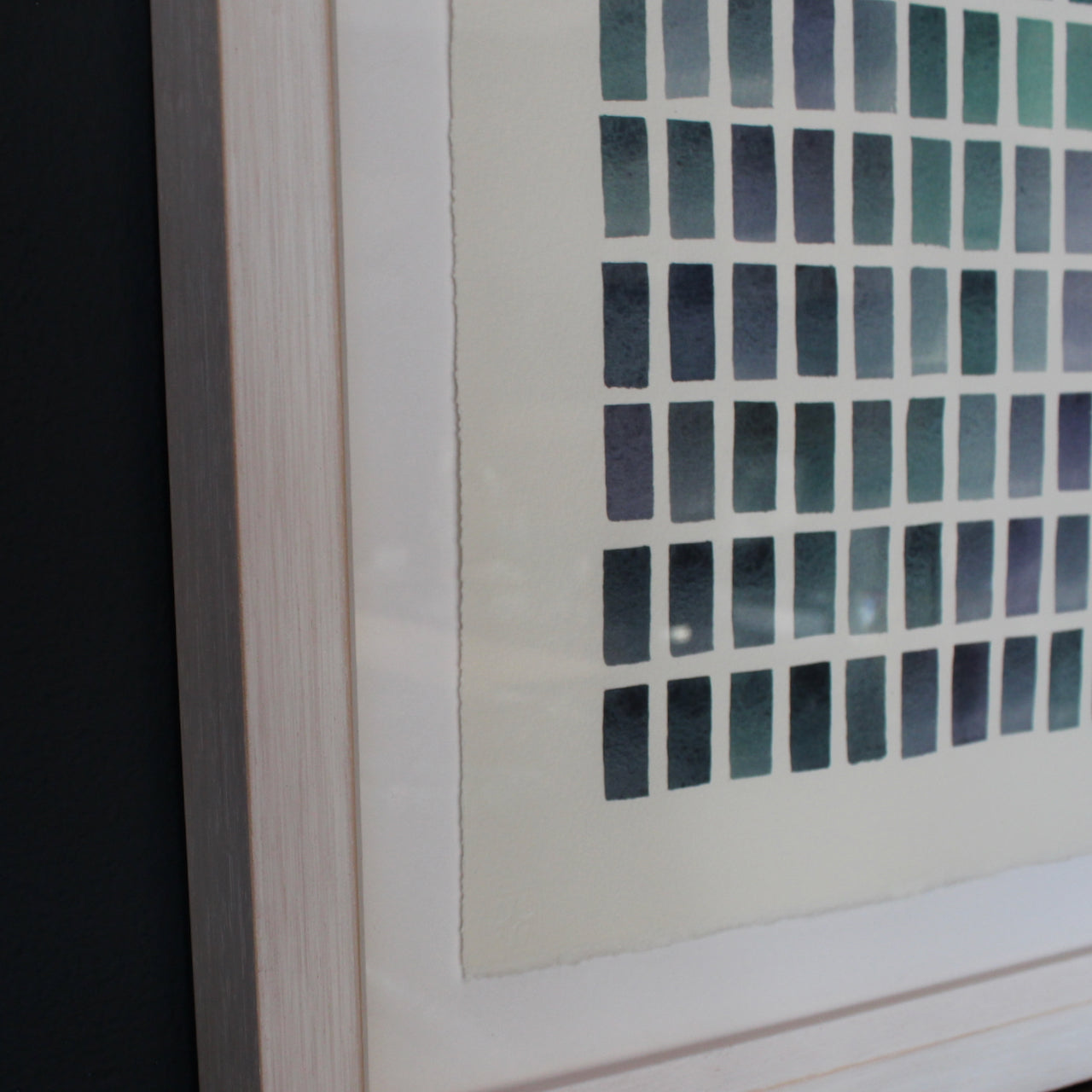 close up detail of abstract watercolour painting of green, purple and yellow coloured rectangles in a grid by Devon based artist David Muddyman