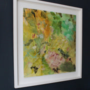 a framed abstract oil painting in yellow, greens and pink by artist Katy Brown of a garden of flowers it is called Amongst the Starflowers