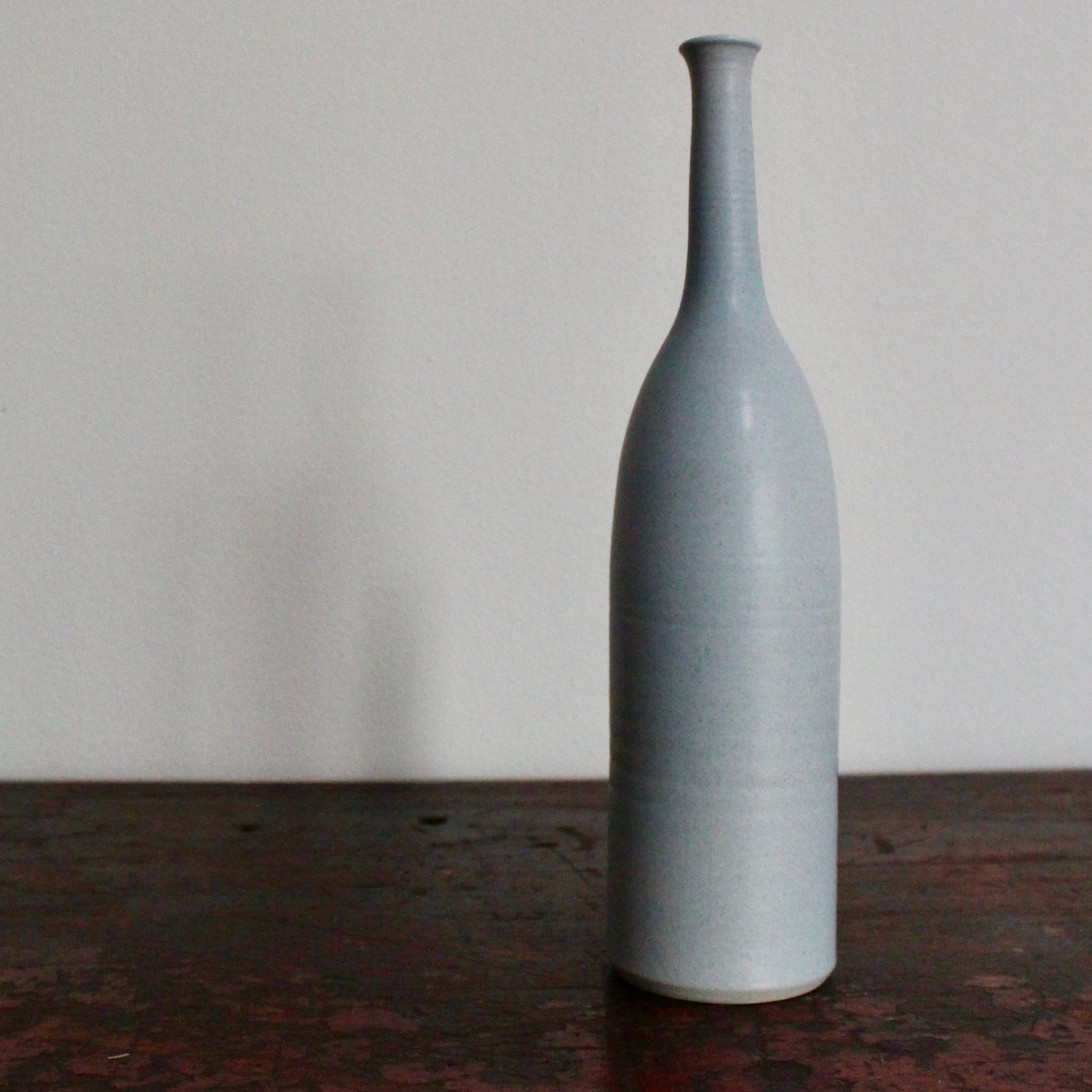a pale blue bottle by UK ceramicist Lucy Burley.
