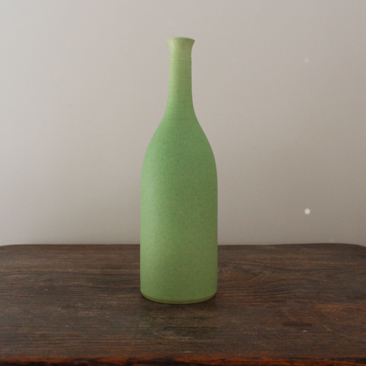 green ceramic bottle by Lucy Burley, Uk ceramic artist